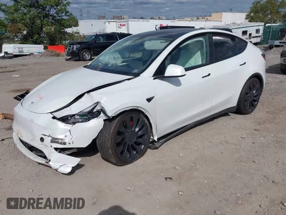 2023 Tesla Model Y Performance with VIN 7SAYGDEF0PF601457, listed as a IAAI auction lot 43361742 with Not provided miles and . Bid and sale history available at DreamBid. Image 2.