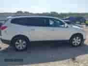 2012 Chevrolet Traverse 1LT z VIN 1GNKVGED0CJ141414, wystawiony jako IAAI lot #42932488 z przebiegiem 170 057 mil mil oraz . Historia ofert i sprzedaży dostępna na DreamBid. Obrazek 14.