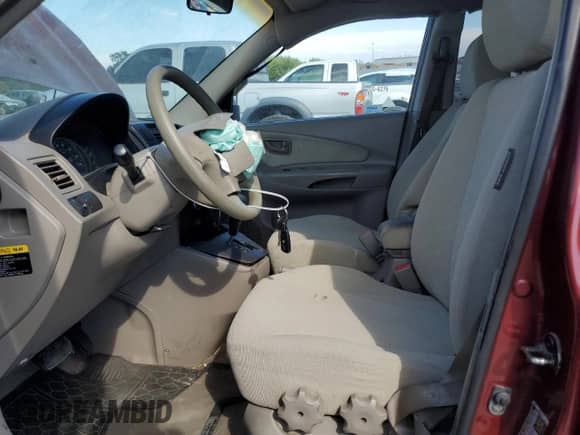 2005 Hyundai Tucson GL z VIN KM8JM12B75U119107, wystawiony jako Copart lot #71539895 z przebiegiem Nie podano mil oraz Szkoda całkowita • Salvage title. Historia ofert i sprzedaży dostępna na DreamBid. Obrazek 7.