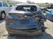 2024 Tesla Model Y Long Range with VIN 7SAYGDEE1RF064558, listed as a Copart auction lot 62367204 with 2,706 mi miles and Salvage title. Bid and sale history available at DreamBid. Image 6.