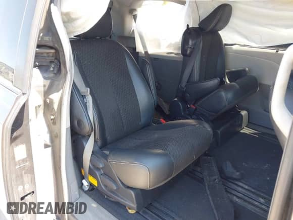 2012 Toyota Sienna SE with VIN 5TDXK3DC5CS232979, listed as a IAAI auction lot 43136504 with 198,231 mi miles and . Bid and sale history available at DreamBid. Image 8.