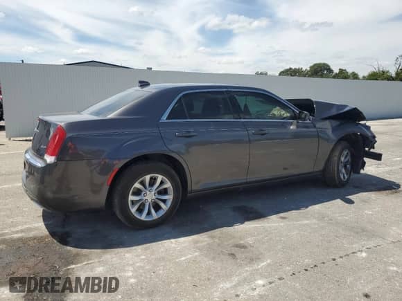 2015 Chrysler 300 Limited with VIN 2C3CCAAG8FH785799, listed as a Copart auction lot 70536145 with 122,416 mi miles and Salvage title. Bid and sale history available at DreamBid. Image 3.