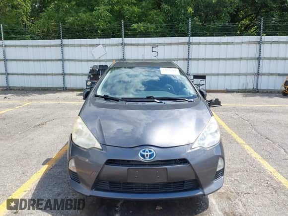 2014 Toyota Prius One with VIN JTDKDTB38E1562235, listed as a IAAI auction lot 43048418 with 164,639 mi miles and . Bid and sale history available at DreamBid. Image 12.