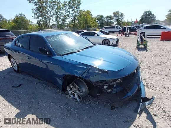 2023 Dodge Charger SXT with VIN 2C3CDXBG7PH660986, listed as a IAAI auction lot 43233732 with 23,404 mi miles and . Bid and sale history available at DreamBid. Image 1.