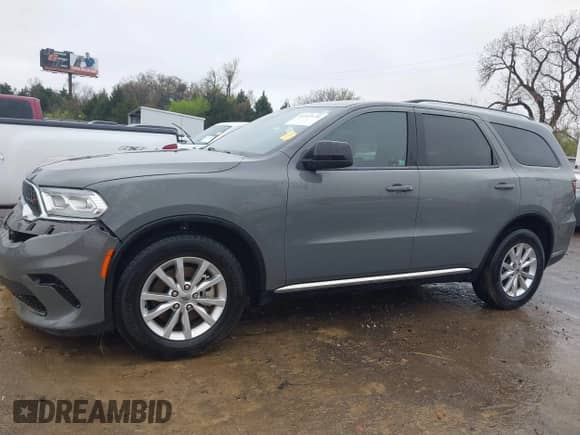 2023 Dodge Durango SXT with VIN 1C4RDHAG9PC569511, listed as a IAAI auction lot 41952170 with 55,653 mi miles and . Bid and sale history available at DreamBid. Image 14.