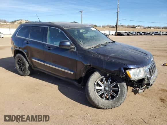 2011 Jeep Grand Cherokee 70th Anniversary z VIN 1J4RR4GT4BC511713, wystawiony jako Copart lot #85508804 z przebiegiem 121 972 mil mil oraz Szkoda całkowita • Salvage title. Historia ofert i sprzedaży dostępna na DreamBid. Obrazek 4.