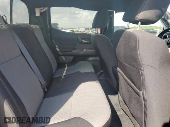 2023 Toyota Tacoma SR5 with VIN 3TMDZ5BN9PM142495, listed as a Copart auction lot 68995295 with 59,145 mi miles and Salvage title. Bid and sale history available at DreamBid. Image 10.
