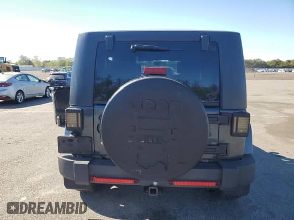 2007 Jeep Wrangler Unlimited Sahara z VIN 1J4GA591X7L147255, wystawiony jako Copart lot #82341025 z przebiegiem 189 755 mil mil oraz Czysty tytuł • Clean title. Historia ofert i sprzedaży dostępna na DreamBid. Obrazek 6.