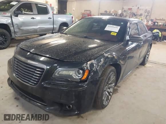 2013 Chrysler 300 C John Varvatos Limited Edition with VIN 2C3CCADG1DH741099, listed as a IAAI auction lot 41899456 with 141,107 mi miles and . Bid and sale history available at DreamBid. Image 2.