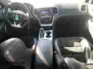 2016 Jeep Grand Cherokee SRT Night с VIN 1C4RJFDJ9GC301028, выставлен на аукционе Copart как лот 74682544 с пробегом 83 196 миль миль и Списание • Salvage title. История ставок и продаж доступна на DreamBid. Изображение 8.