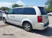 2009 Dodge Grand Caravan SXT with VIN 2D8HN54159R626944, listed as a IAAI auction lot 43056559 with 220,711 mi miles and . Bid and sale history available at DreamBid. Image 3.