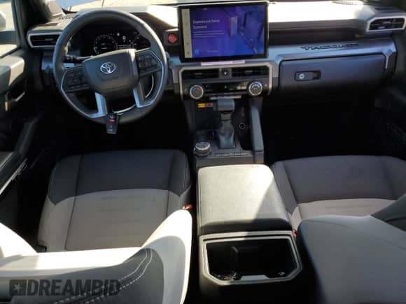 2024 Toyota Tacoma TRD Off Road with VIN 3TMLB5JN8RM000837, listed as a Copart auction lot 82183745 with 14,184 mi miles and Salvage title. Bid and sale history available at DreamBid. Image 8.
