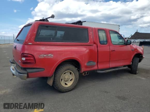 1997 Ford F-150 с VIN 1FTDX08W4VKA51941, выставлен на аукционе Copart как лот 68773355 с пробегом 109 687 миль миль и Списание • Salvage title. История ставок и продаж доступна на DreamBid. Изображение 3.