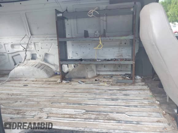 2005 Ford Econoline Cargo with VIN 1FTRE14W65HA89689, listed as a IAAI auction lot 42607059 with 260,935 mi miles and . Bid and sale history available at DreamBid. Image 8.