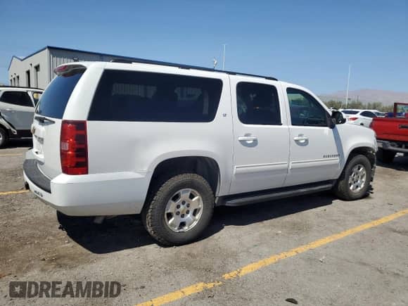 2014 Chevrolet Suburban LT с VIN 1GNSKJE74ER210948, выставлен на аукционе Copart как лот 70897705 с пробегом 257 668 миль миль и Списание • Salvage title. История ставок и продаж доступна на DreamBid. Изображение 3.