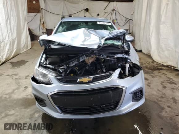 2017 Chevrolet Sonic LS с VIN 1G1JB5SG9H4168349, выставлен на аукционе Copart как лот 83782755 с пробегом Не указан миль и Списание • Salvage title. История ставок и продаж доступна на DreamBid. Изображение 5.