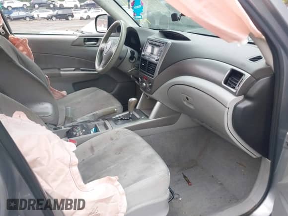 2009 Subaru Forester X with VIN JF2SH63659H759425, listed as a IAAI auction lot 39921368 with 216,092 mi miles and . Bid and sale history available at DreamBid. Image 5.