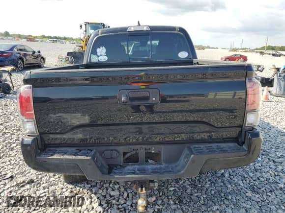 2022 Toyota Tacoma Limited with VIN 3TMGZ5AN8NM506451, listed as a Copart auction lot 56830185 with 58,941 mi miles and Salvage title. Bid and sale history available at DreamBid. Image 6.