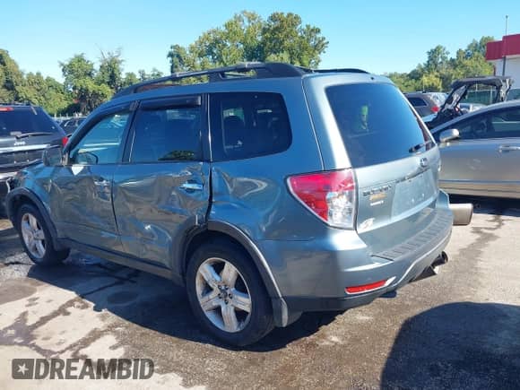 2009 Subaru Forester X Limited z VIN JF2SH64669H797065, wystawiony jako IAAI lot #43149123 z przebiegiem 146 639 mil mil oraz . Historia ofert i sprzedaży dostępna na DreamBid. Obrazek 19.