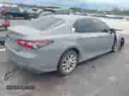 2021 Toyota Camry LE z VIN 4T1C11AK7MU480046, wystawiony jako IAAI lot #43289437 z przebiegiem 70 687 mil mil oraz . Historia ofert i sprzedaży dostępna na DreamBid. Obrazek 4.