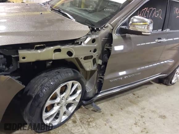 2020 Jeep Grand Cherokee Summit with VIN 1C4RJFJG1LC170714, listed as a IAAI auction lot 42247702 with 78,614 mi miles and . Bid and sale history available at DreamBid. Image 6.