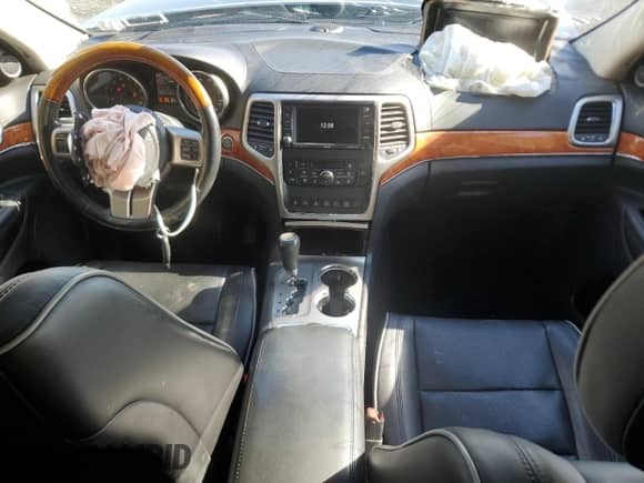 2011 Jeep Grand Cherokee Overland with VIN 1J4RR6GT2BC586843, listed as a Copart auction lot 82640575 with 105,457 mi miles and Salvage title. Bid and sale history available at DreamBid. Image 8.