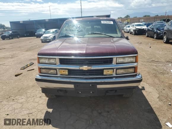 1995 Chevrolet Tahoe z VIN 1GNEK13K3SJ460244, wystawiony jako Copart lot #68296485 z przebiegiem 131 211 mil mil oraz Szkoda całkowita • Salvage title. Historia ofert i sprzedaży dostępna na DreamBid. Obrazek 5.