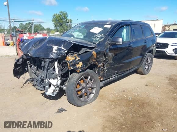 2021 Jeep Grand Cherokee 80th Anniversary z VIN 1C4RJFBG5MC770510, wystawiony jako IAAI lot #42838763 z przebiegiem 41 155 mil mil oraz . Historia ofert i sprzedaży dostępna na DreamBid. Obrazek 16.