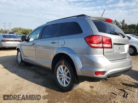 2017 Dodge Journey SXT with VIN 3C4PDCBG3HT684992, listed as a Copart auction lot 71731805 with 107,689 mi miles and Salvage title. Bid and sale history available at DreamBid. Image 2.