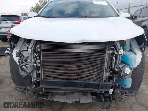 2018 Chevrolet Equinox LT с VIN 2GNAXJEV0J6352926, выставлен на аукционе IAAI как лот 43259696 с пробегом 70 395 миль миль и . История ставок и продаж доступна на DreamBid. Изображение 6.