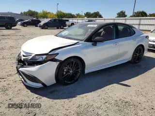 2024 Toyota Camry Hybrid XSE with VIN 4T1K31AK9RU060477, listed as a Copart auction lot 67827005 with 46,730 mi miles and Salvage title. Bid and sale history available at DreamBid. Image 1.