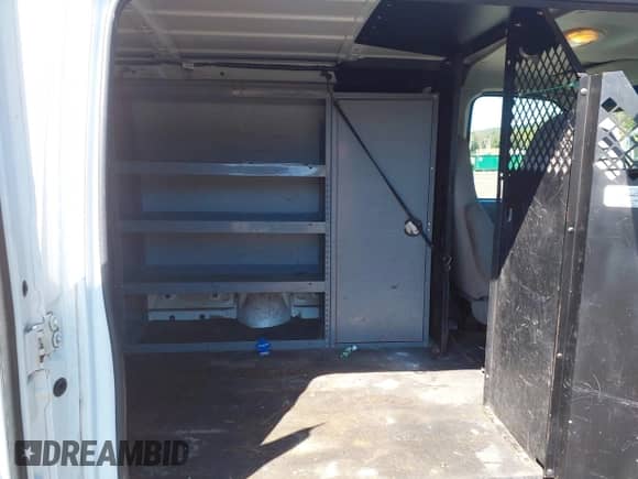 2007 Ford Econoline Cargo Commercial with VIN 1FTSE34L37DB49604, listed as a IAAI auction lot 43102604 with 144,154 mi miles and . Bid and sale history available at DreamBid. Image 8.