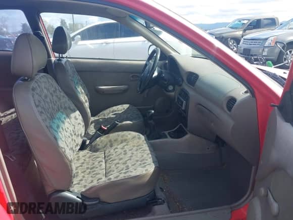 1995 Hyundai Accent z VIN KMHVD14N9SU047038, wystawiony jako IAAI lot #41895712 z przebiegiem 186 094 mil mil oraz . Historia ofert i sprzedaży dostępna na DreamBid. Obrazek 5.