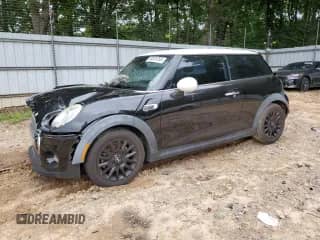2014 MINI Hardtop with VIN WMWXM5C59ET936421, listed as a Copart auction lot 66024765 with 103,576 mi miles and Salvage title. Bid and sale history available at DreamBid. Image 1.