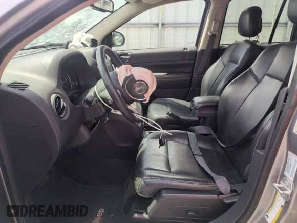 2016 Jeep Compass Latitude with VIN 1C4NJDEB4GD638985, listed as a Copart auction lot 62556945 with 83,142 mi miles and Salvage title. Bid and sale history available at DreamBid. Image 7.