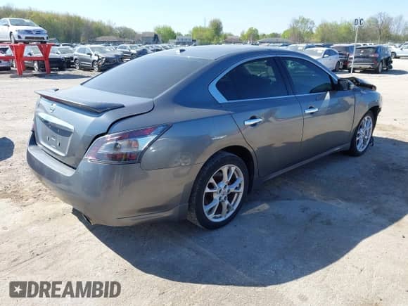 2014 Nissan Maxima SV z VIN 1N4AA5AP6EC448359, wystawiony jako IAAI lot #42225559 z przebiegiem Nie podano mil oraz . Historia ofert i sprzedaży dostępna na DreamBid. Obrazek 4.