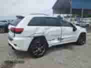 2016 Jeep Grand Cherokee SRT with VIN 1C4RJFDJ7GC413858, listed as a Copart auction lot 57406255 with 112,408 mi miles and Salvage title. Bid and sale history available at DreamBid. Image 3.