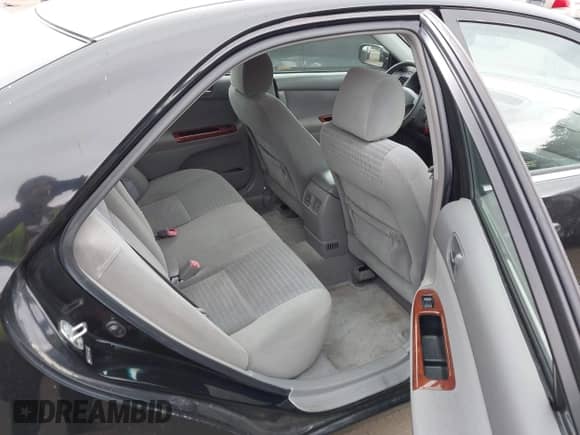 2005 Toyota Camry LE with VIN 4T1BE30K95U405962, listed as a IAAI auction lot 43040450 with 100,149 mi miles and . Bid and sale history available at DreamBid. Image 8.