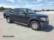 2007 Nissan Frontier XE with VIN 1N6BD06TX7C402581, listed as a Copart auction lot 70501685 with 198,579 mi miles and Clean title. Bid and sale history available at DreamBid. Image 4.