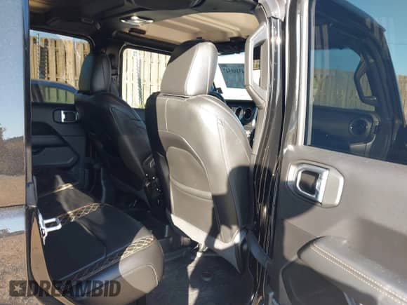 2022 Jeep Wrangler Unlimited Sahara Altitude with VIN 1C4HJXEG6NW238843, listed as a IAAI auction lot 43108547 with 15,051 mi miles and . Bid and sale history available at DreamBid. Image 8.