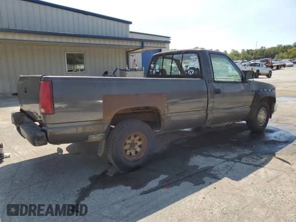 1993 GMC Sierra 1500 с VIN 1GTDC14Z2PE539076, выставлен на аукционе Copart как лот 71788105 с пробегом 128 840 миль миль и Списание • Salvage title. История ставок и продаж доступна на DreamBid. Изображение 3.