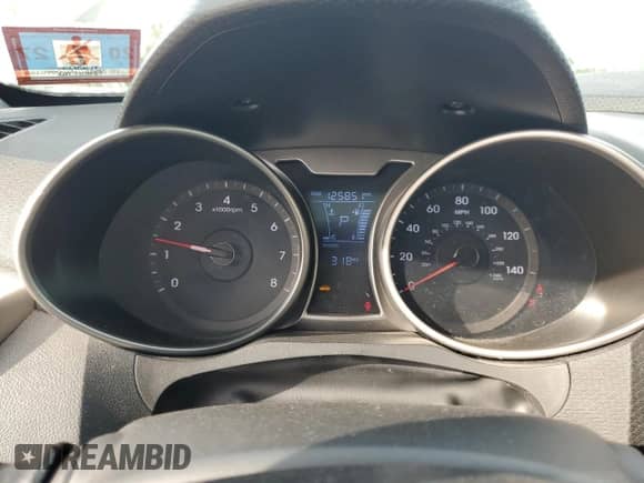 2013 Hyundai Veloster w/Gray Int z VIN KMHTC6AD4DU108401, wystawiony jako Copart lot #84835955 z przebiegiem 125 851 mil mil oraz Szkoda całkowita • Salvage title. Historia ofert i sprzedaży dostępna na DreamBid. Obrazek 9.