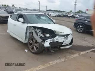 2013 Hyundai Veloster w/Black Int z VIN KMHTC6AD0DU155604, wystawiony jako IAAI lot #43314820 z przebiegiem 141 866 mil mil oraz . Historia ofert i sprzedaży dostępna na DreamBid. Obrazek 1.