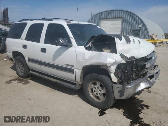 2002 Chevrolet Tahoe LS with VIN 1GNEC13Z22R173750, listed as a Copart auction lot 53551715 with 202,011 mi miles and Salvage title. Bid and sale history available at DreamBid. Image 4.