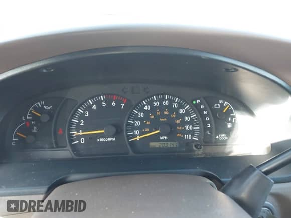 2002 Toyota Tundra Limited z VIN 5TBBT48112S328606, wystawiony jako IAAI lot #43483929 z przebiegiem 203 147 mil mil oraz . Historia ofert i sprzedaży dostępna na DreamBid. Obrazek 7.