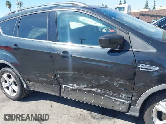 2014 Ford Escape SE with VIN 1FMCU0GX8EUE40872, listed as a IAAI auction lot 43359211 with 146,863 mi miles and . Bid and sale history available at DreamBid. Image 6.