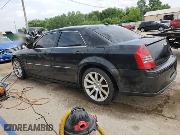 2006 Chrysler 300 C SRT-8 z VIN 2C3LA73W76H102777, wystawiony jako Copart lot #60065925 z przebiegiem 97 765 mil mil oraz Szkoda całkowita • Salvage title. Historia ofert i sprzedaży dostępna na DreamBid. Obrazek 2.
