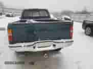 1997 Toyota Tacoma z VIN 4TAWM72N2VZ315302, wystawiony jako Copart lot #87952085 z przebiegiem 190 437 mil mil oraz Szkoda całkowita • Salvage title. Historia ofert i sprzedaży dostępna na DreamBid. Obrazek 6.
