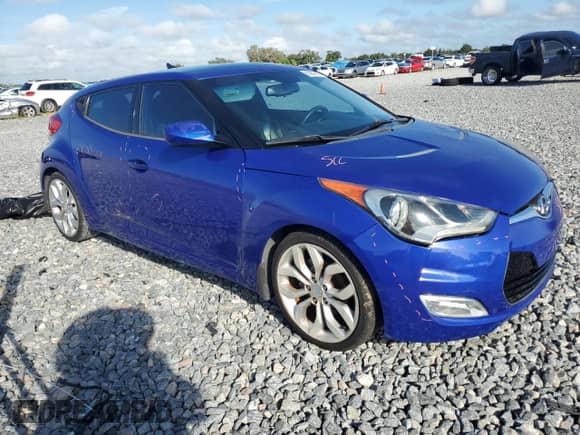 2012 Hyundai Veloster w/Gray Int with VIN KMHTC6AD2CU054322, listed as a Copart auction lot 83847905 with 105,784 mi miles and Salvage title. Bid and sale history available at DreamBid. Image 4.