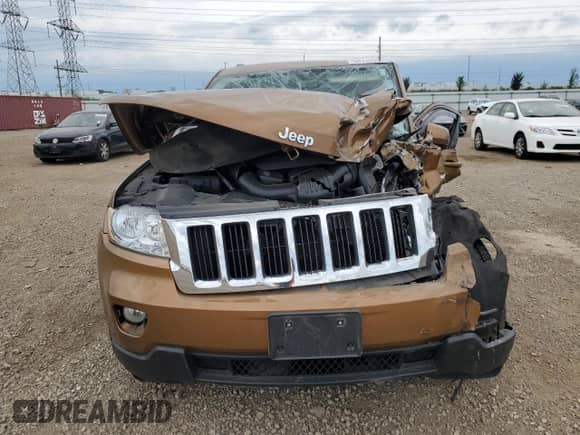 2011 Jeep Grand Cherokee 70th Anniversary with VIN 1J4RR4GG6BC646162, listed as a Copart auction lot 64792705 with Not provided miles and Salvage title. Bid and sale history available at DreamBid. Image 5.